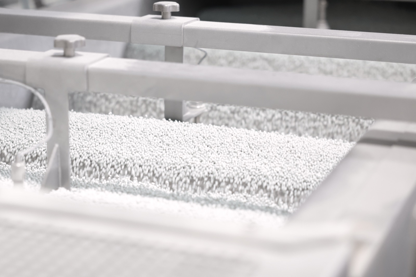 T2T PET chips produced from the polyester fraction of blended textile waste.