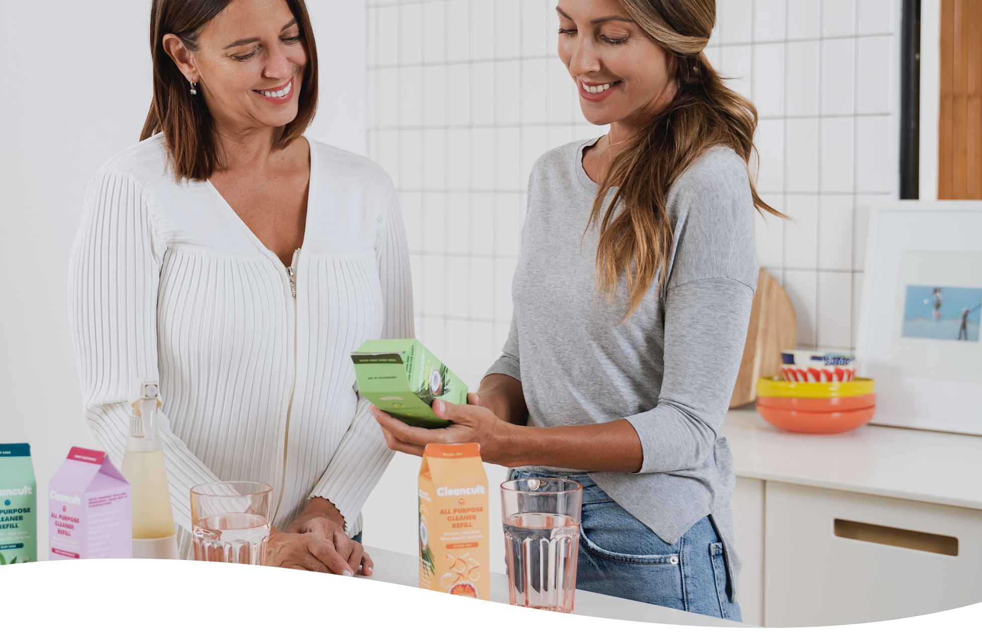 Women Holding Carton