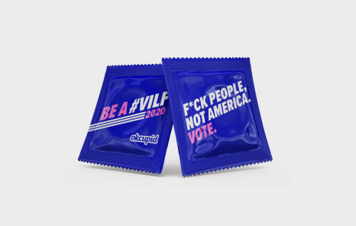 Two condom wrappers propped against one another to show the front and back of the packaging