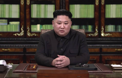 Deep fake of Kim Jong-un sitting at a desk