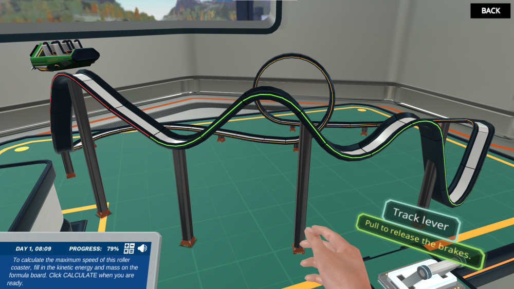 A model of the Labster roller coaster in the design lab. Pulling the lever releases the miniature car so that the user can observe its motion along the track.