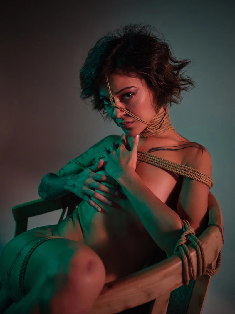 Naked Leyla bound to the chair