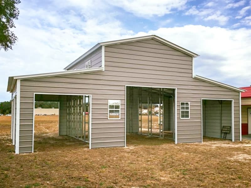 Custom tubular steel agricultural barn installed on rural property