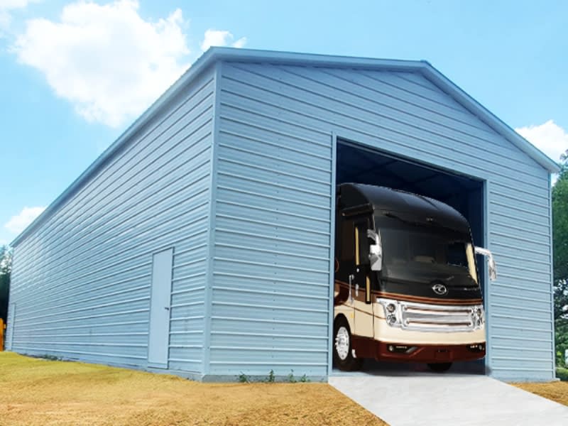 Enclosed steel RV garage with motorhome