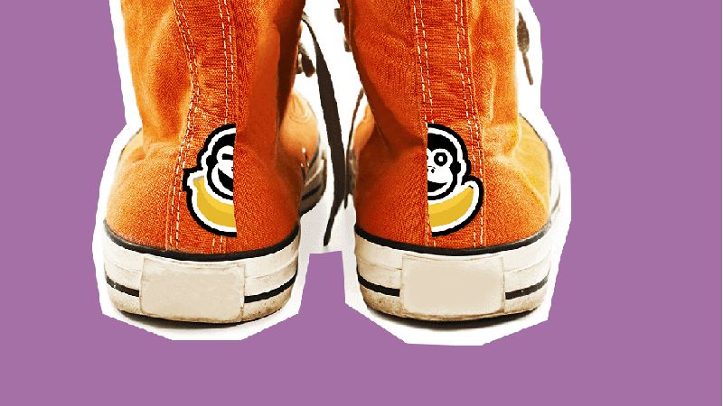 A pair of bright orange sneakers, stick it to your morning shoe routine parenting hacks