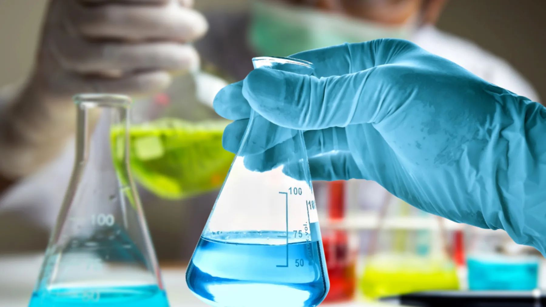 Image of glassware being handled, development of alcohol versus non-alcohol products