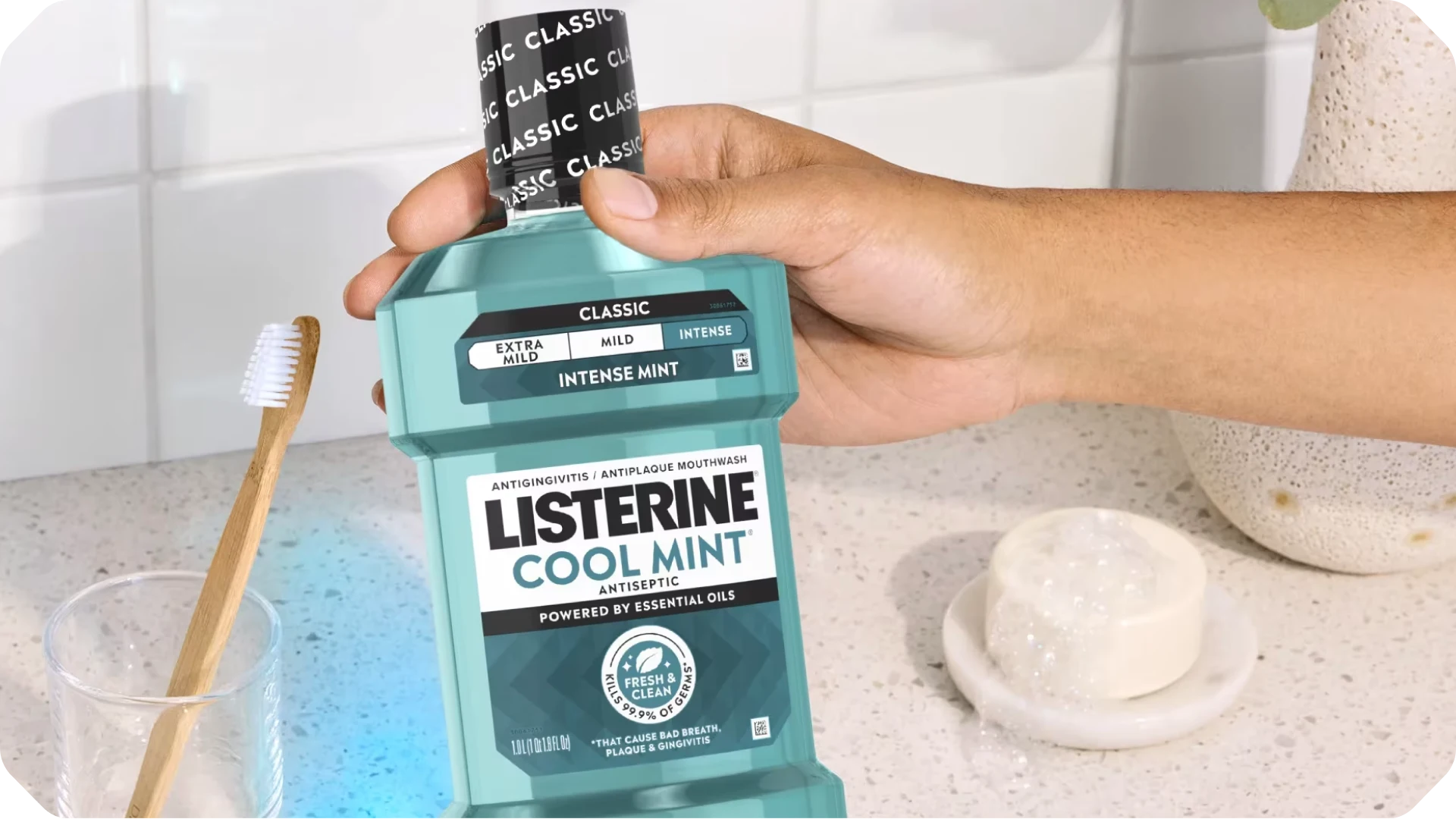 Step 3: Rinse: Listerine® COOL MINT bottle. Rinse moment ready