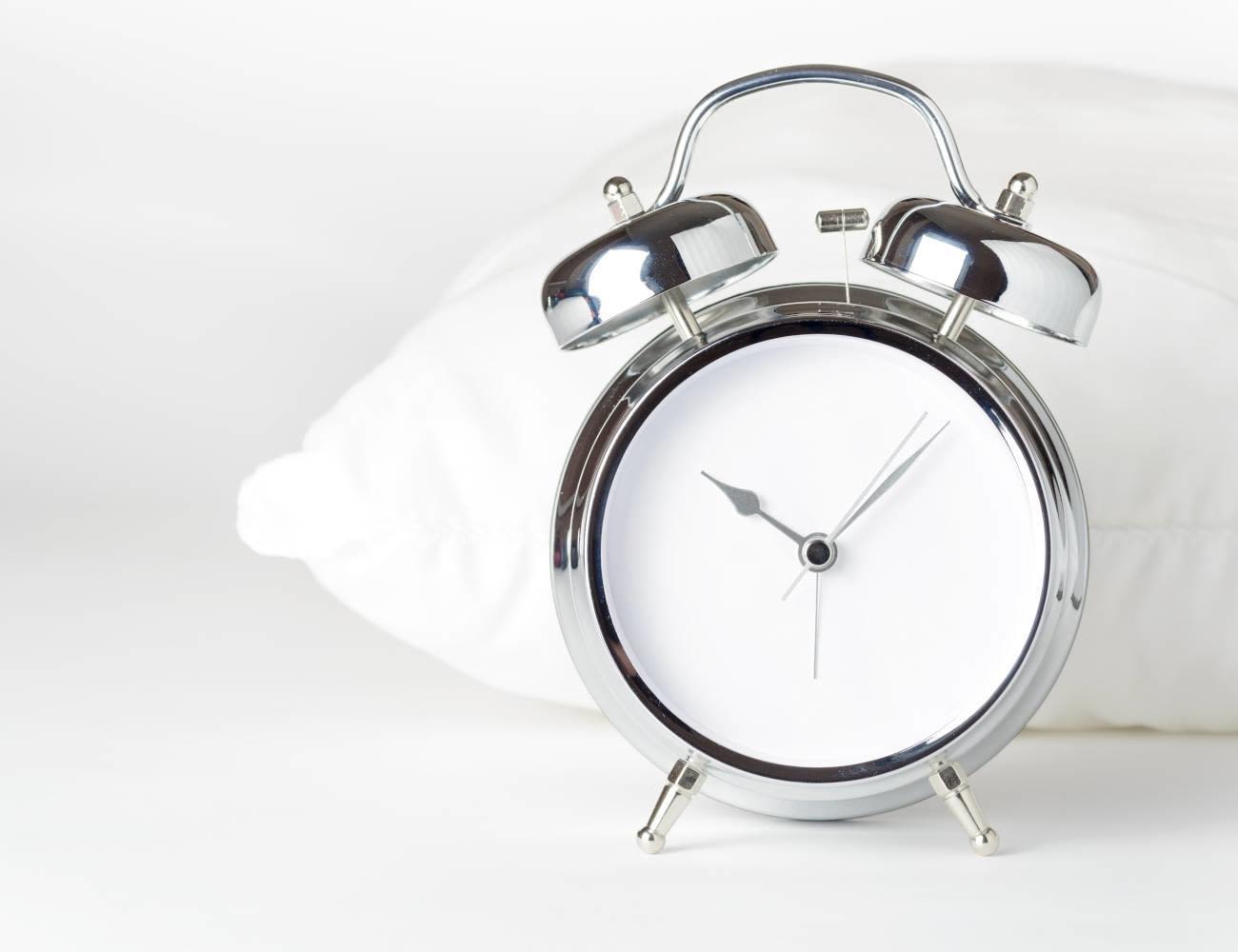 An alarm clock image, indicating a peaceful setting to keep Brushing your teeth for Two Minutes