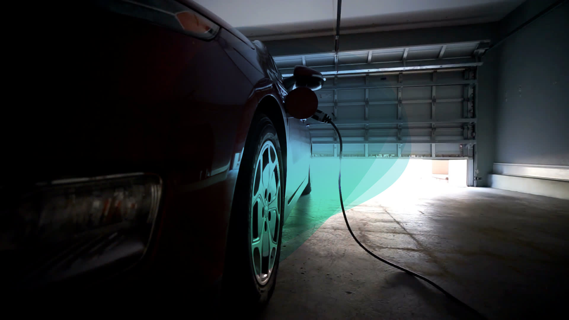 EV in garage with swirls