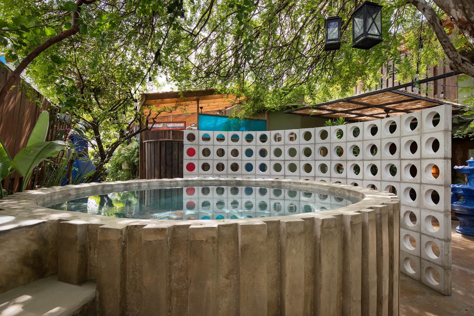 The pool and breeze-block screen at Dreamcatcher, the Dreamers Welcome boutique hotel in Ocean Park.
