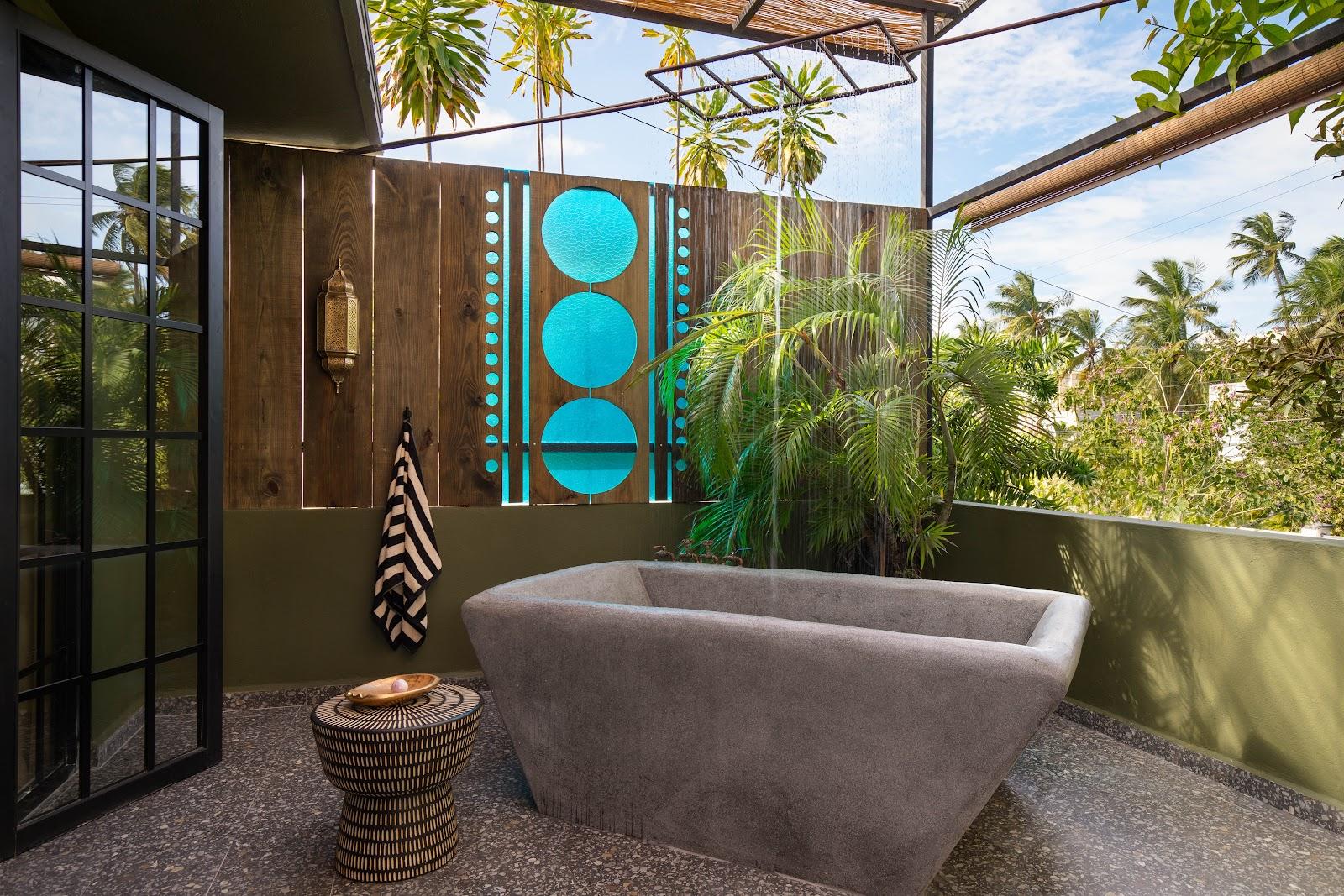 A suite terrace with an outdoor soaking tub at Dreamcatcher, the flagship boutique hotel of Dreamers Welcome.