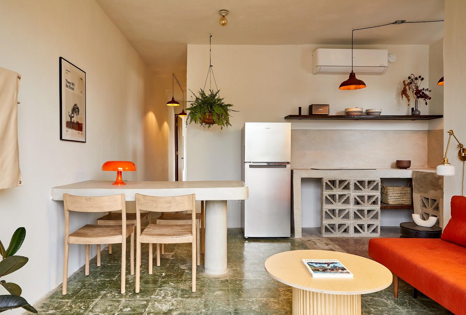 The kitchen and dining area of an apartment at APT by DW in Santurce, San Juan.