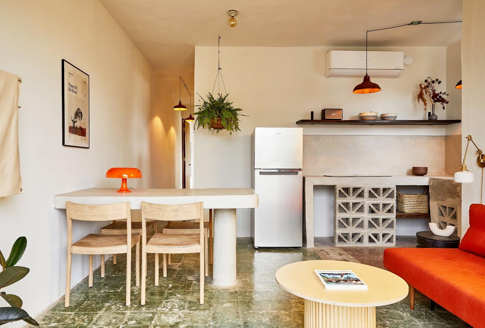 The kitchen and dining area of an apartment at APT by DW in Santurce, San Juan.