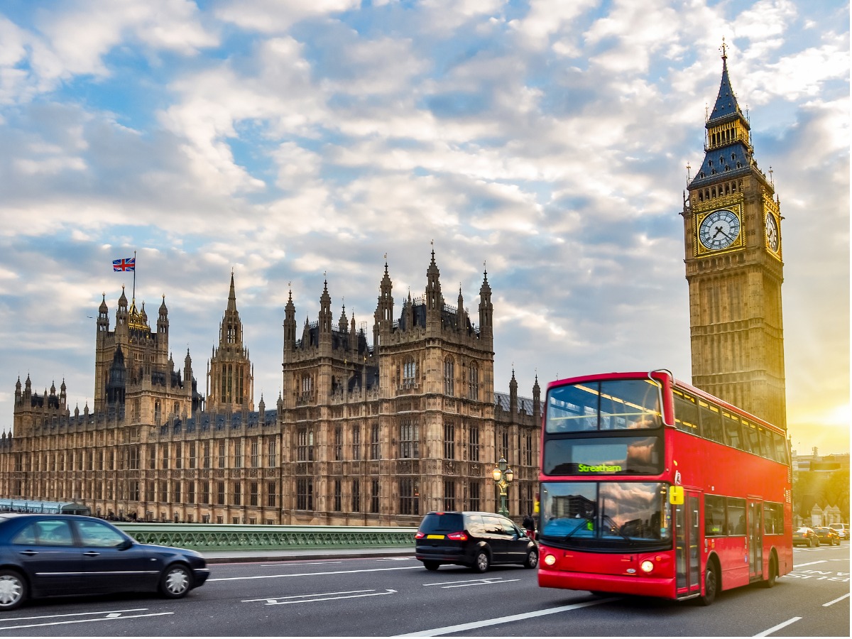 houses-of-parliament-with-big-ben-and-doubledecker-bus-on-westminster-picture-id1199886073