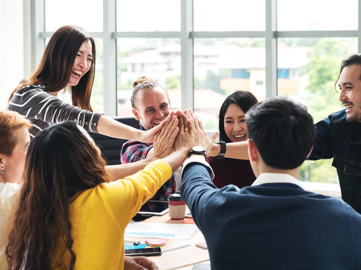 group-of-young-multiethnic-diverse-people-gesture-hand-high-five-and-picture-id1031261250