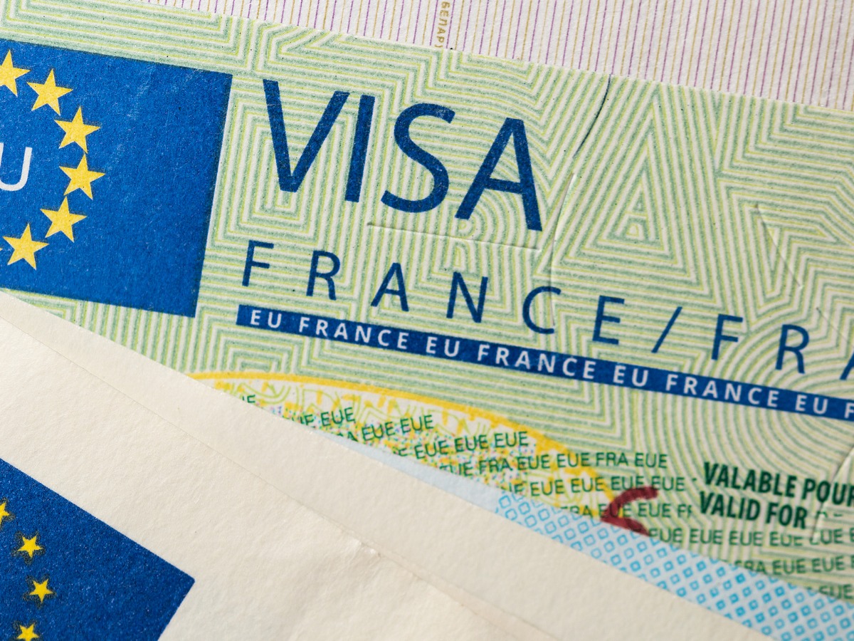 schengen-visa-in-the-passport-issued-by-the-french-embassy-picture-id1204269455