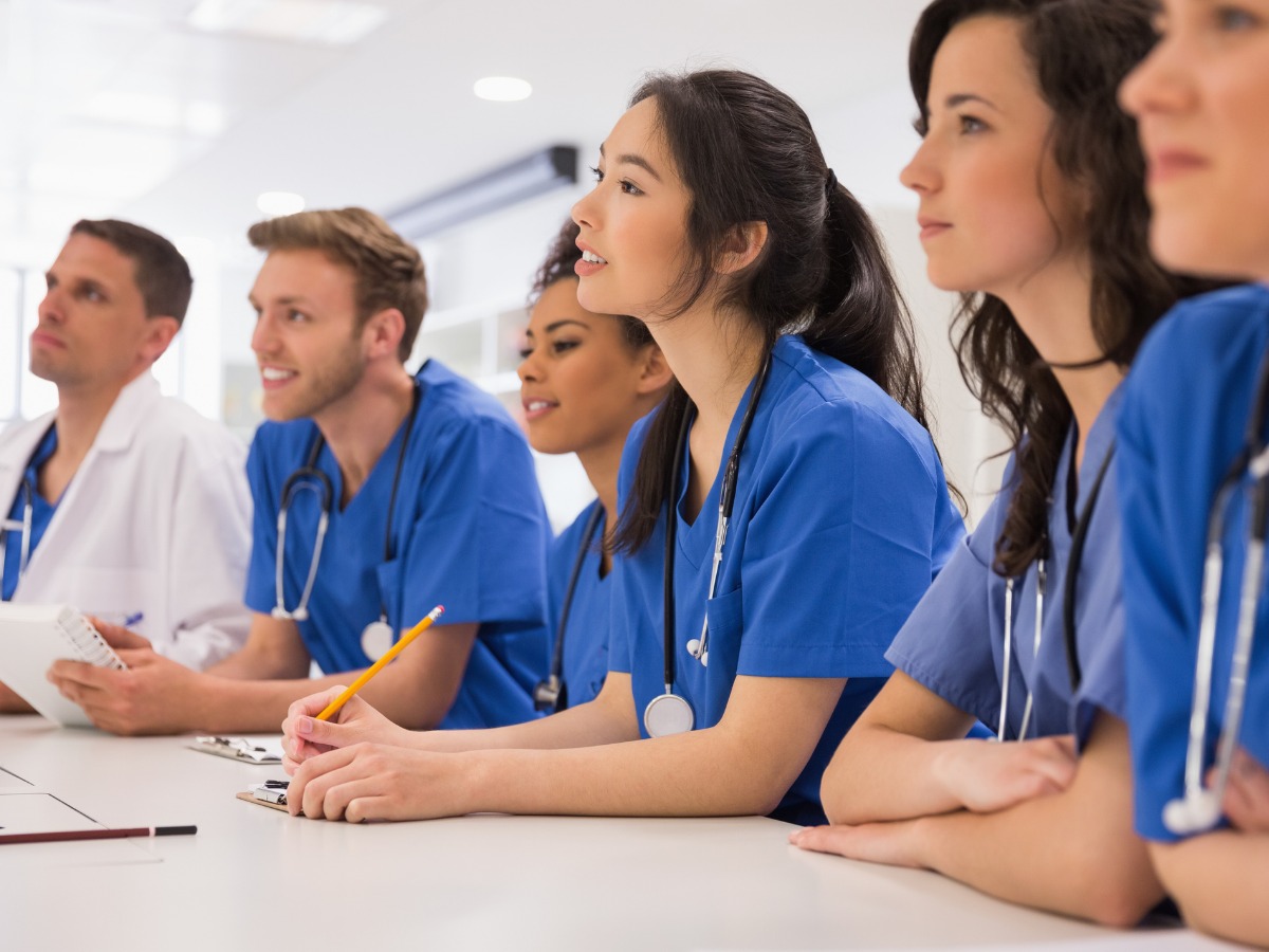 medical-students-listening-sitting-at-desk-picture-id532548555