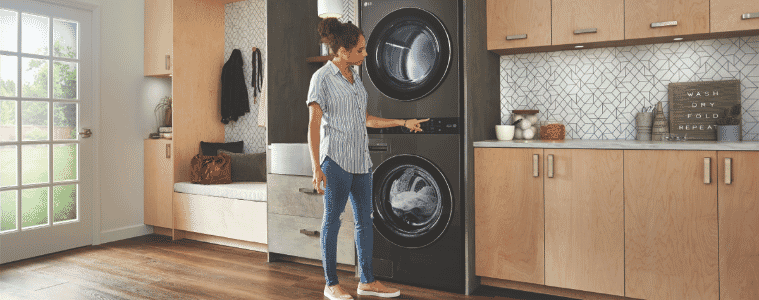 A woman washes a load of laundry in her LG WashTower 17kg10kg Combo Washer Dryer 