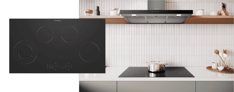 A Westinghouse cooktop in a white and sage green kitchen