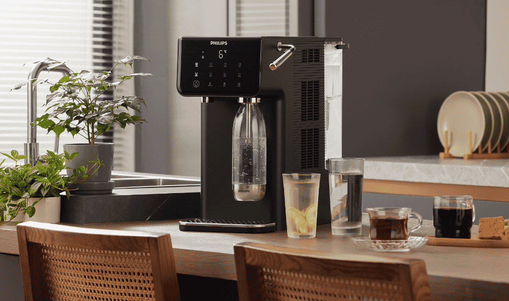 The Black Philips Sparkling water station sitting on a kitchen bench