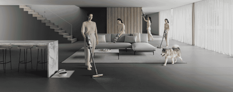 Woman using her NEW DYSON VACUUM around her home 