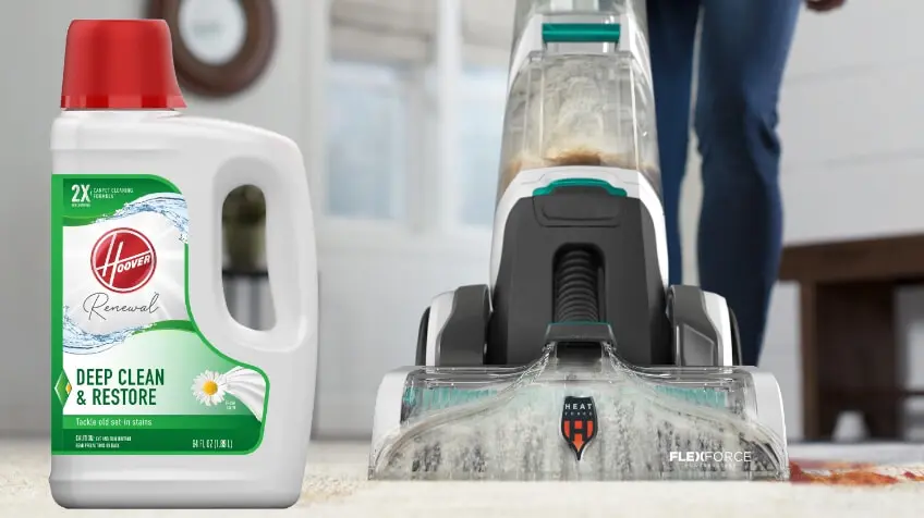 A Hoover cleaning solution next to a Hoover carpet cleaner
