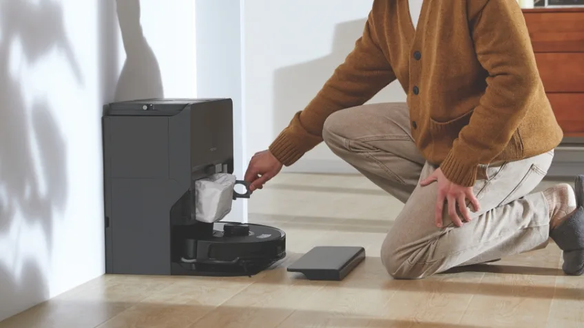 Close up image of a Roborock vacuum bag being replaced