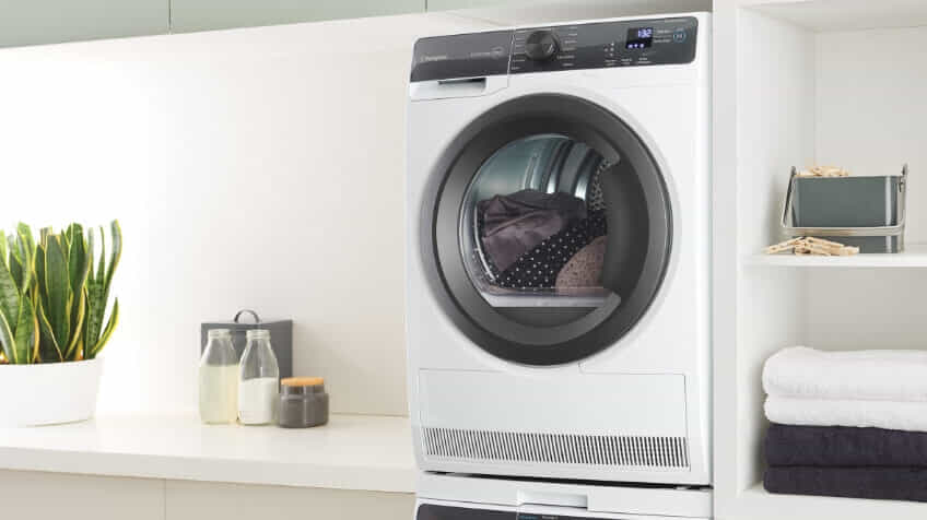 A Westinghouse dryer in a white laundry