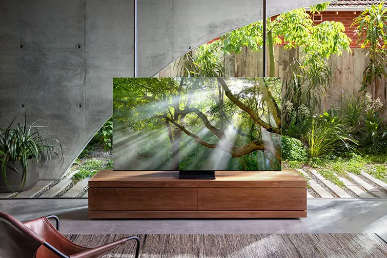 New 8K TV on a TV stand in a modern outdoor entertainment area