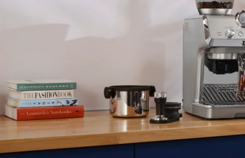 Close up of De'Longhi coffee machine accessories.