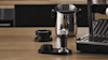 Close up of De'Longhi coffee machine accessories.