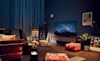 A wide shot of an LG OLED TV in a modern lounge room