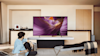 Man watching Samsung 2025 TV.