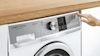 Close up image of a Fisher & Paykel washer dryer combo.