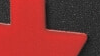 A close up of the red Plus Burner control dial
