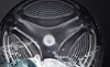 LG 14kg Front Load Washing Machine in modern laundry