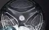 LG 14kg Front Load Washing Machine in modern laundry