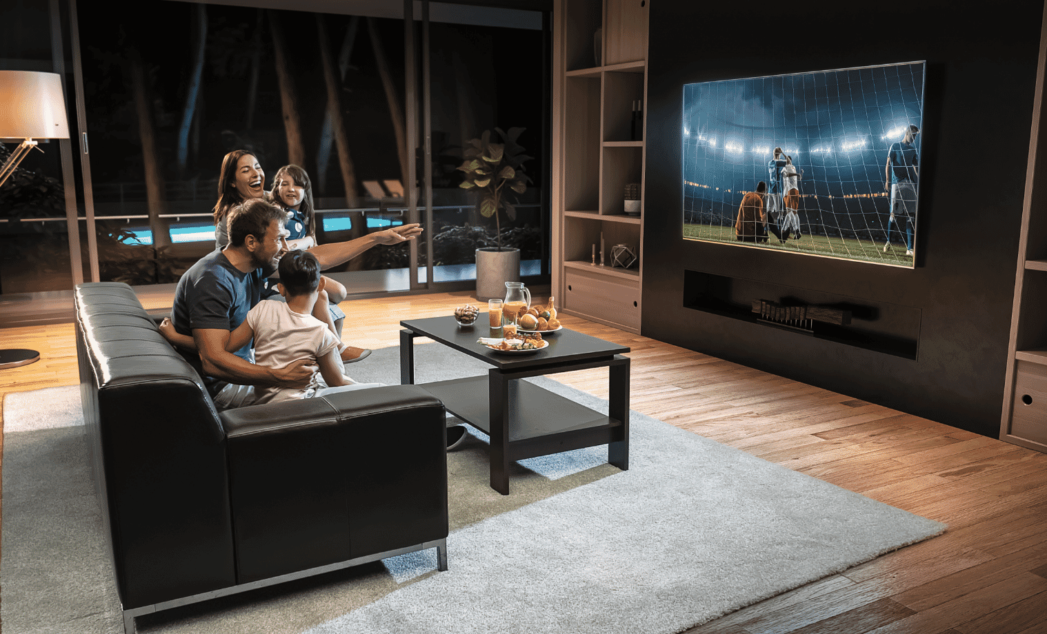 A family watching TV in their living room