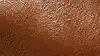 A close up of a man wearing the Bose quietcomfort Ultra earbuds