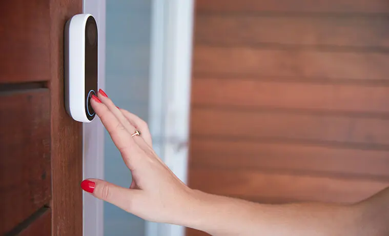 Closeup view of a woman pressing the button on a video doorbell next to the front door of a house