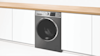Side on angle of a Fisher & Paykel Steam Refresh washing machine.