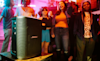 The Bose S1 Pro Wireless PA System plays music at a lively party