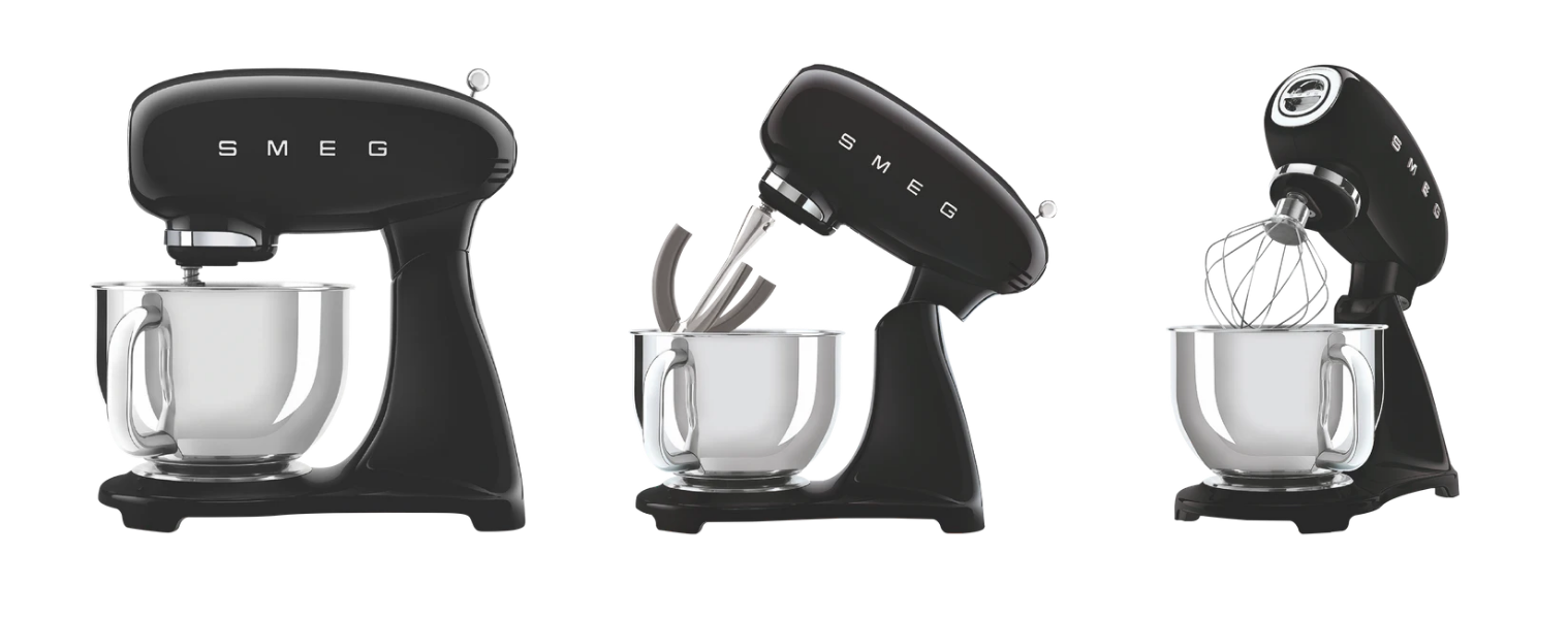 Image of the Smeg 50s Style Stand Mixer on a kitchen bench with a plate of crepes and ingredients