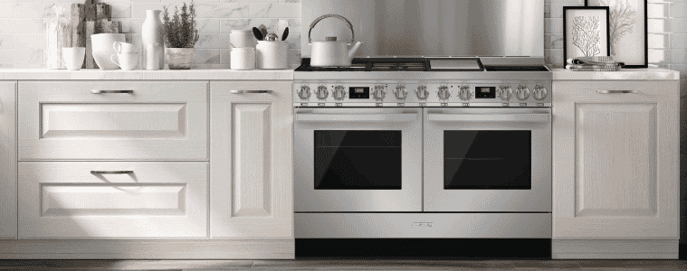 A double freestanding cooker in a Hamptons style kitchen