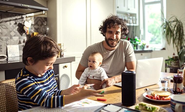 Couple are looking at their mobile phones and pointing out the great features