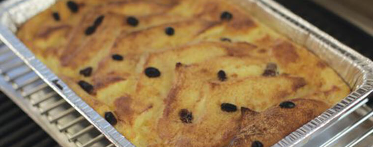 Layered bread pudding in a silver grill baking tray