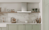 Samsung suite of cooking appliances in mint green kitchen 