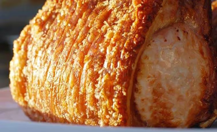 Close up image of a crackling pork roast
