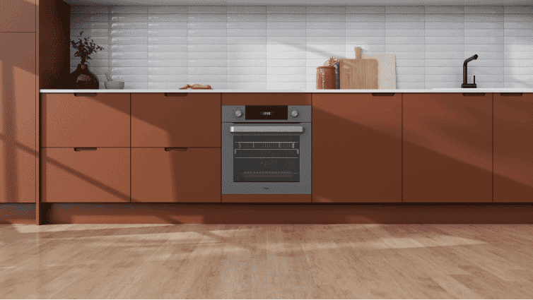 Haier mid-grey oven in a green kitchen
