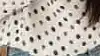Woman using Vision AI to manage food expiry with AI Family Hub.
